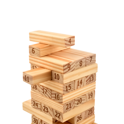 Close up of wooden tumbling tower balance game during play